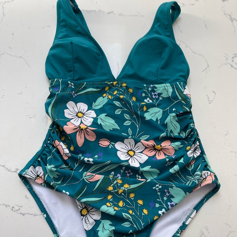 Brand new one piece bathing suit with tag